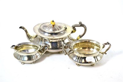 Lot 309 - A silver three piece tea service