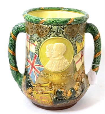 Lot 321 - A Royal Doulton loving cup, to celebrate the completion of 25 years of the reign of King George...