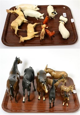 Lot 324 - Beswick horses and foals, donkeys, stag, doe and fawn, pigs, sheep and foxes on two trays,...