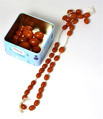 Lot 346 - A (snapped) strand of amber beads