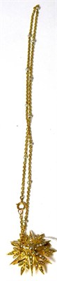 Lot 347 - A 9ct gold and seed pearl star pendant and chain (a.f.)