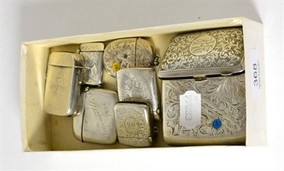 Lot 368 - Two silver cigarette cases, five silver vesta cases and a silver mounted lighter