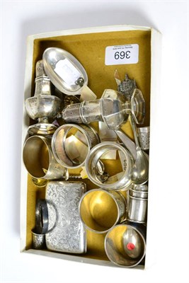 Lot 369 - Assorted silver including napkin rings, pepperettes, cigarette case, thimbles etc