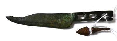 Lot 385 - A European Iron Age Hallstatt bronze knife blade circa 800-600 BC, the blade curved and handle...