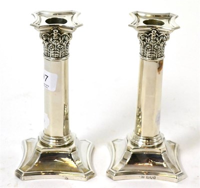 Lot 397 - A pair of silver candlesticks, London, 1913