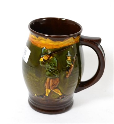 Lot 406 - A Royal Doulton Kingsware golfing jug