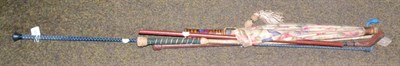 Lot 426 - A swagger stick, two riding crops, one modern schooling whip and a parasol