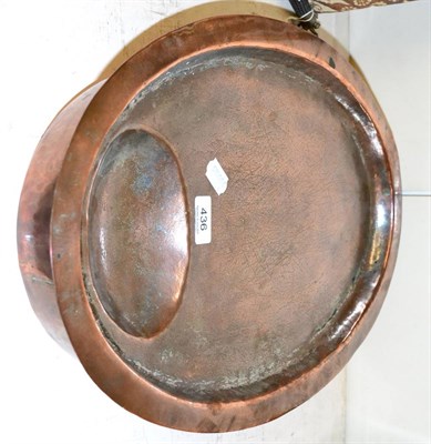 Lot 436 - A 19th century copper meat dish with gravy well