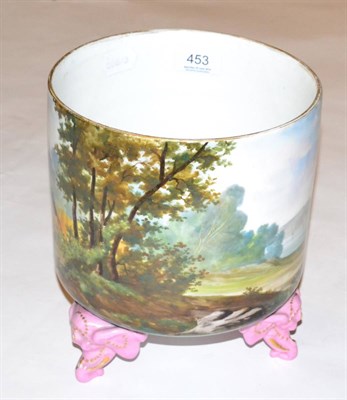 Lot 453 - A Continental cache pot, hand decorated with pastoral scene on pink elephant head feet