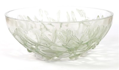 Lot 513 - René Lalique (French, 1860-1945): A Frosted and Green Stained Mistletoes Gui Glass Bowl,...