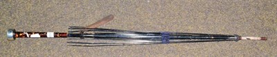 Lot 489 - An S Fox & Co Paragon parasol with tortoiseshell handle and silver pommel, lacking canopy, 86cm...