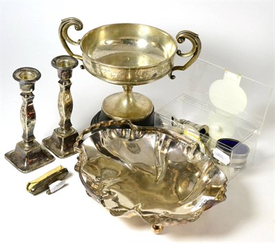 Lot 494 - A group of silver and silver plated wares to include a pair of candlesticks, a condiment set, a...