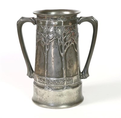 Lot 518 - David Veasey for Liberty & Co: A Pewter Twin-Handled Loving Cup, covered by honesty and verse...