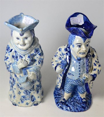 Lot 502 - Blue and white tin glaze toby job and another similar (2)