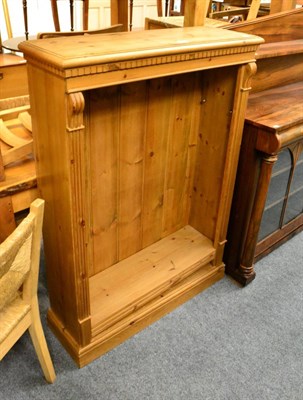 Lot 1019 - A pine open bookcase