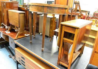 Lot 1028 - Two Edwardian mahogany Sutherland tables and a mahogany demi-lune foldover tea table (3)