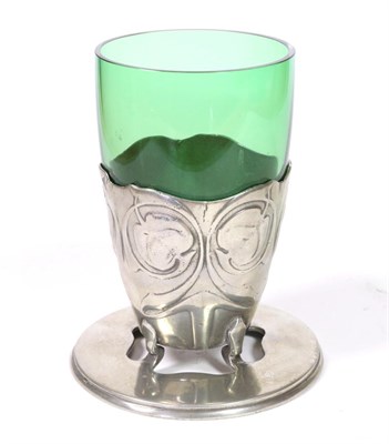 Lot 521 - Archibald Knox (1864-1933) for Liberty & Co: A Tudric Pewter Vase, with green glass liner, cast...