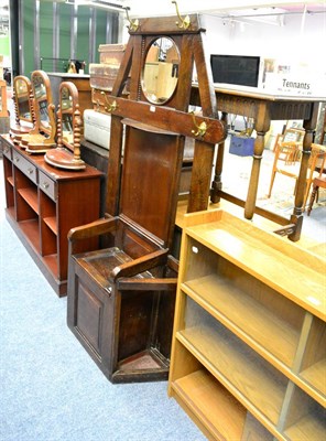 Lot 1034 - Oak hall stand with mirror back and hinged seat