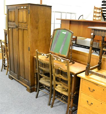 Lot 1038 - Reproduction oak linen fold double wardrobe, dressing table and mirror, two occasional tables,...