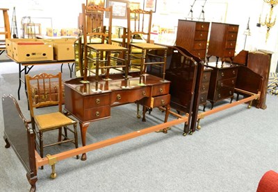 Lot 1048 - A reproduction mahogany Beithcraft Ltd dressing table and two bedside chests, together with two...