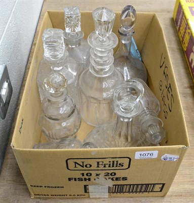 Lot 1076 - Eight decanters including triple ring neck examples