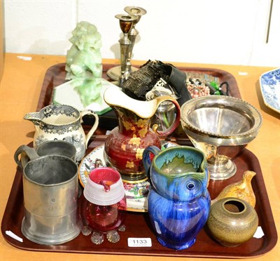 Lot 1133 - Two trays including silver candlesticks, three silver mounted photograph frames, silver buckle...