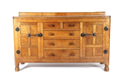 Lot 535 - Mouseman: A Robert Thompson English Oak 5ft Sideboard, with raised upstand above two cupboard doors