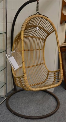 Lot 1159 - A 1970s free swinging rattan and bamboo egg chair