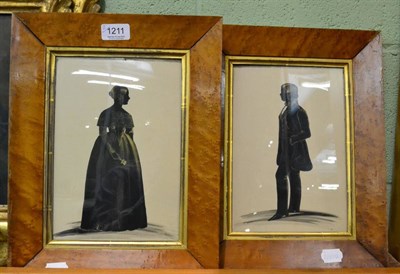 Lot 1211 - A pair of 19th century silhouette portraits