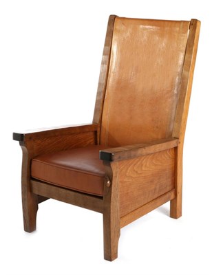 Lot 545 - Mouseman: A Robert Thompson English Oak Smoker's Chair, slung leather back, straight arms, cow hide