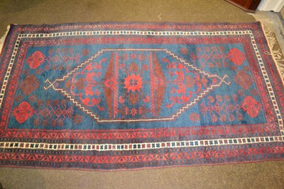 Lot 1267 - A Bergama rug, West Anatolia, the indigo field centred by a stepped medallion framed by...