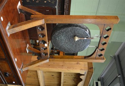 Lot 1279 - A gong in Gothic oak frame with hammer/sounding stick