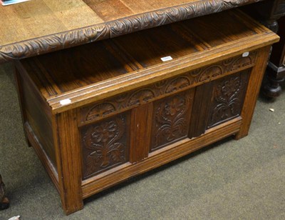 Lot 1280 - Carved and panelled oak blanket chest in 18th century style