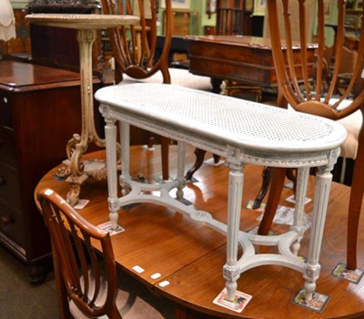 Lot 1283 - A William IV cream painted tripod table, with inset glass top and a painted caned stool