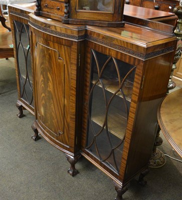 Lot 1288 - A mahogany display cabinet with two glazed doors and one panel door