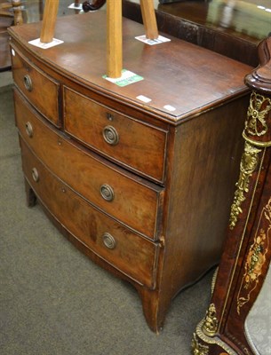 Lot 1294 - An early 19th century mahogany bow front chest of drawers