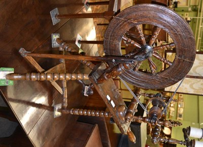 Lot 1296 - A 19th century spinning wheel