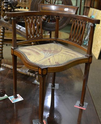 Lot 1297 - An Edwardian inlaid corner armchair