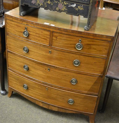 Lot 1301 - A 19th century mahogany bow front four height chest of drawers