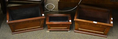 Lot 1304 - Three crossbanded mahogany jardinieres/planters of rectangular form with lion mask handles