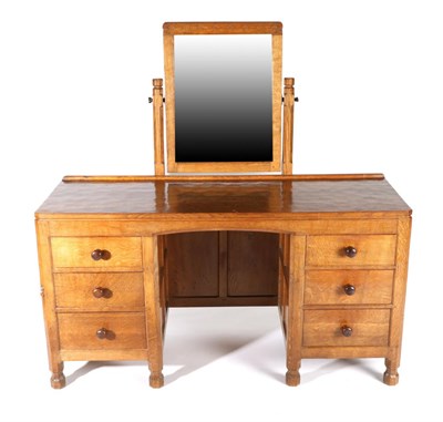 Lot 552 - Mouseman: A Robert Thompson Panelled English Oak Dressing Table, with rectangular fixed central...