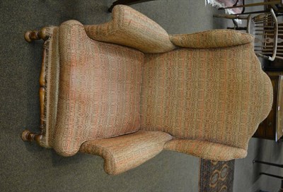 Lot 1323 - Georgian style wing armchair