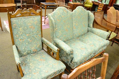 Lot 1325 - An 18th century style camel back settee, together with an open armchair, both with green...