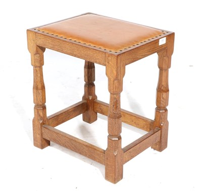 Lot 553 - Mouseman: A Robert Thompson English Oak Dressing Table Stool, with upholstered cow hide seat,...