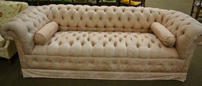 Lot 1330 - A Victorian Chesterfield settee upholstered in pale pink damask