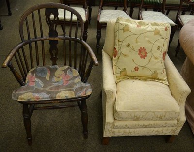 Lot 1331 - Yellow upholstered low armchair and a country style Windsor armchair