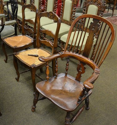 Lot 1336 - Pair of French style country back ladder back chairs with rush seats and a 19th century Windsor...