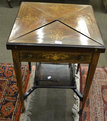 Lot 1345 - A late Victorian rosewood envelope card table