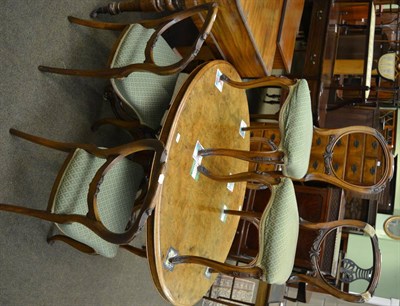 Lot 1346 - A Victorian oval loo table and six chairs