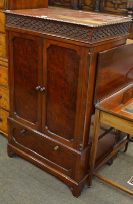 Lot 1350 - A reproduction mahogany drinks cabinet